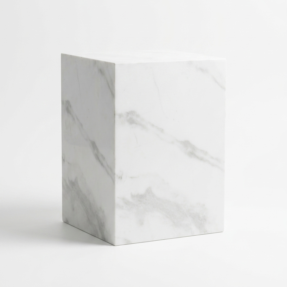 A rectangular white marble pedestal or side table with soft gray veining, photographed on a clean white studio background.