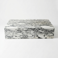 A rectangular coffee table with a gray-green and white marble pattern, photographed on a clean white background.