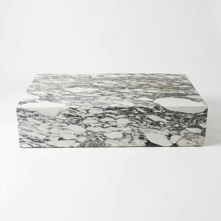 A rectangular coffee table with a gray-green and white marble pattern, photographed on a clean white background.