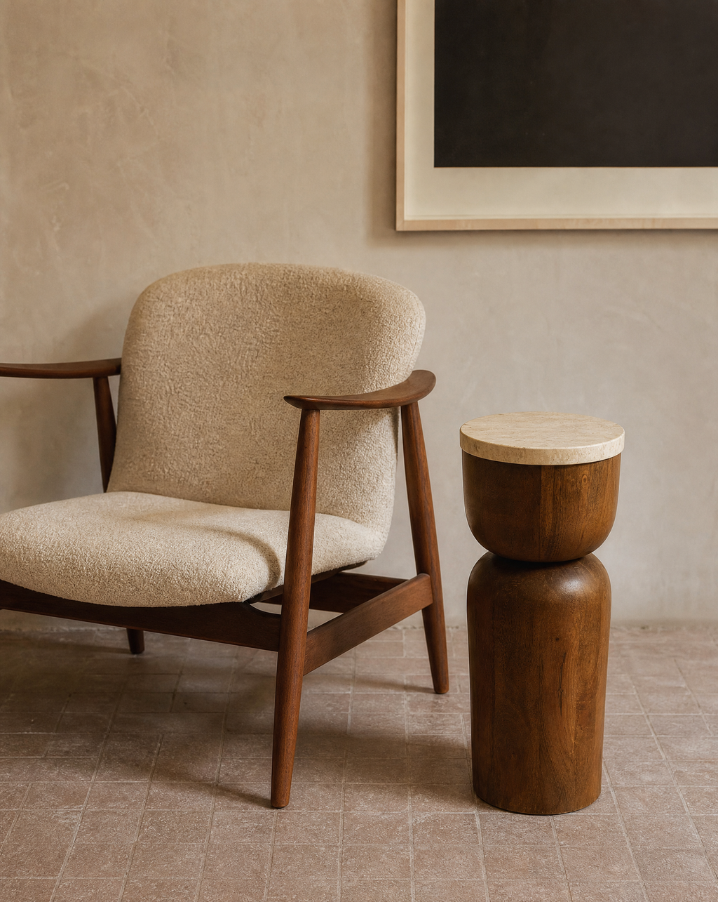 A mid-century modern armchair with textured beige bouclé upholstery and a dark wood frame, positioned next to a matching dark wood side table with a travertine stone top in a warm, neutral-toned room.