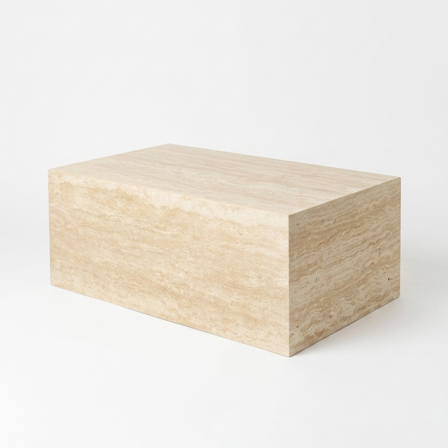 A rectangular stone block or pedestal in a light beige travertine, photographed on a clean white background.