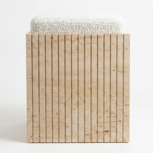 A modern square bench or stool with a textured off-white bouclé top and a slatted natural stone front in a warm beige tone, photographed against a clean white background.